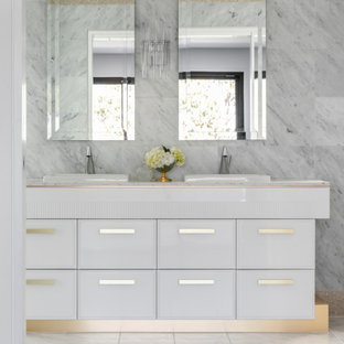 Inspiration for a mid-sized contemporary 3/4 bathroom in Sydney with flat-panel cabinets, white cabinets, gray tile, glass tile, a drop-in sink, grey floor, white benchtops, a double vanity and a floating vanity.