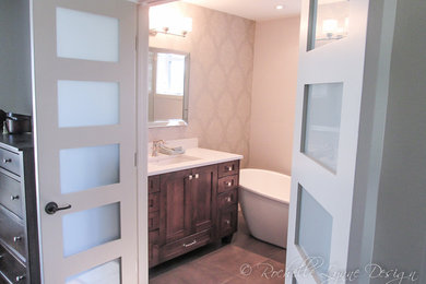 Bathroom - mid-sized traditional master white tile and ceramic tile porcelain tile bathroom idea in Calgary with shaker cabinets, dark wood cabinets, a one-piece toilet, an undermount sink and quartz countertops