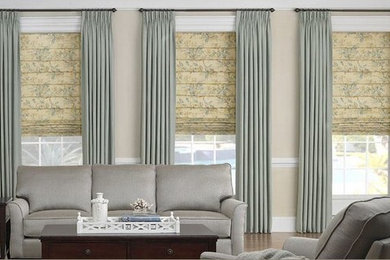 Roman blinds with fancy poles and side drapes