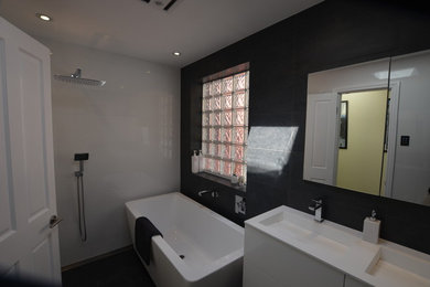 This is an example of a contemporary bathroom in Sydney.