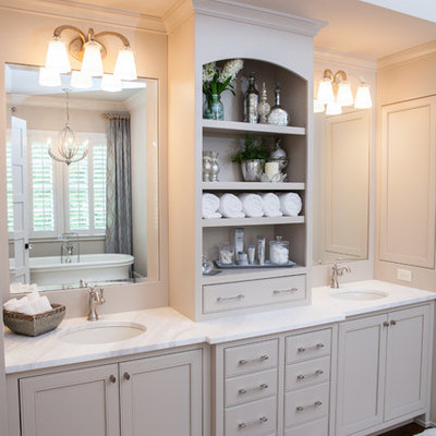 Farmhouse bathroom photo in Atlanta with an undermount sink, recessed-panel cabinets and gray cabinets