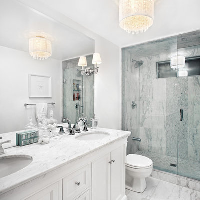 Inspiration for a mid-sized timeless master white tile and stone tile marble floor alcove shower remodel in Toronto with an undermount sink, white cabinets, marble countertops, white walls and recessed-panel cabinets