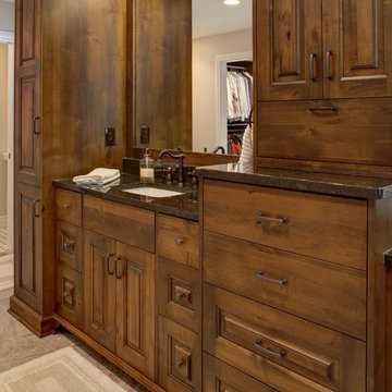 Rustic Alder cabinetry with painted and glazed island.
