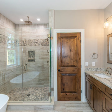 Rustic Bathroom featuring Knotty Alder cabinets and doors