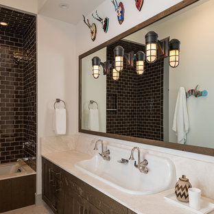 Inspiration for a rustic kids' brown tile and subway tile tub/shower combo remodel in Other with flat-panel cabinets, medium tone wood cabinets, an undermount tub, white walls and a trough sink