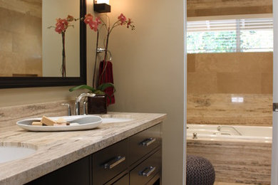 Example of a mid-sized transitional master beige tile and stone tile bathroom design in San Diego with an undermount sink, flat-panel cabinets, dark wood cabinets, a one-piece toilet and beige walls