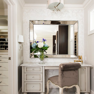 Inspiration for a large transitional master white tile and stone tile marble floor and white floor freestanding bathtub remodel in Other with gray cabinets, gray walls, quartz countertops and beaded inset cabinets