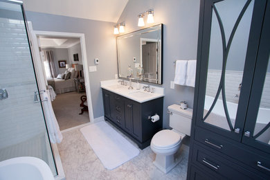Bathroom - mid-sized traditional master white tile and subway tile ceramic tile bathroom idea in Philadelphia with flat-panel cabinets, gray cabinets, a two-piece toilet, gray walls, an undermount sink and quartz countertops