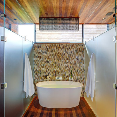 Inspiration for a contemporary brown tile and matchstick tile freestanding bathtub remodel in New York