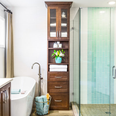 Mid-sized transitional master blue tile porcelain tile bathroom photo in Seattle with an undermount sink, recessed-panel cabinets, dark wood cabinets, a two-piece toilet and white walls