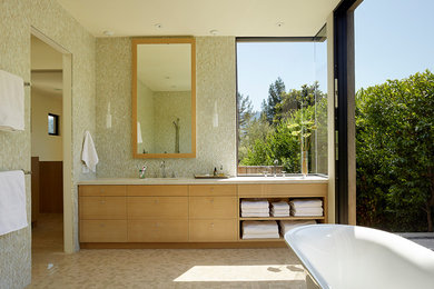На фото: ванная комната в современном стиле с тумбой под две раковины
