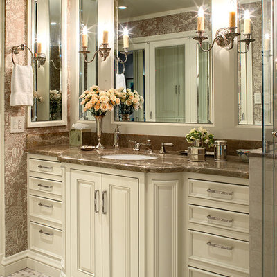 Elegant bathroom photo in San Francisco with an undermount sink, raised-panel cabinets and white cabinets
