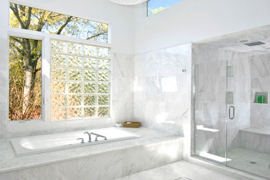 Inspiration for a contemporary white tile and marble tile bathroom remodel in New York