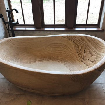 Sandstone Bathtub with brown wavy patterns
