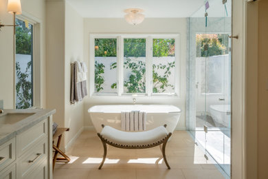 Mid-sized country master gray tile beige floor bathroom photo in Santa Barbara with an undermount sink, a hinged shower door, a built-in vanity, recessed-panel cabinets, white cabinets, beige walls and gray countertops