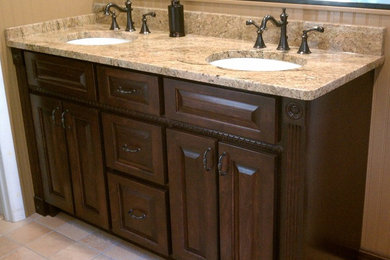 Example of a large trendy bathroom design in Boston with raised-panel cabinets