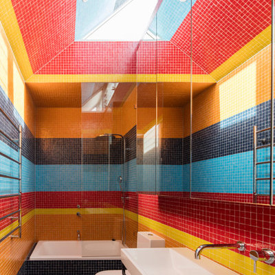 Inspiration for a contemporary multicolored tile and mosaic tile mosaic tile floor and black floor bathroom remodel in Sydney with a wall-mount sink