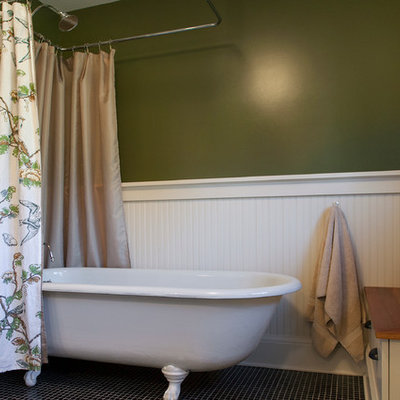 Example of a mid-sized arts and crafts kids' mosaic tile floor bathroom design in Portland with shaker cabinets, white cabinets, wood countertops and green walls