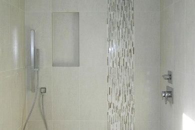 Transitional 3/4 gray tile and stone tile limestone floor alcove shower photo in New York