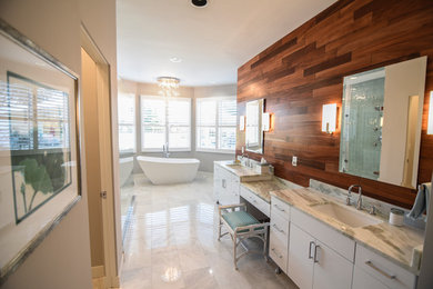 Bathroom - large coastal master gray tile and glass tile marble floor and white floor bathroom idea in Baltimore with furniture-like cabinets, white cabinets, a one-piece toilet, gray walls, an undermount sink, quartzite countertops and a hinged shower door
