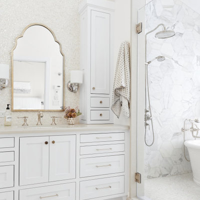 Mid-sized beach style master white tile and mosaic tile white floor and marble floor bathroom photo in San Francisco with shaker cabinets, white cabinets, white walls, an undermount sink, gray countertops, quartz countertops and a hinged shower door