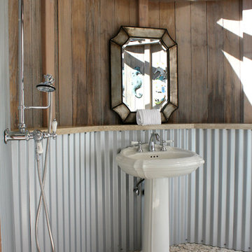 See an Outdoor Bathroom Made From a Water Tank