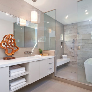 Example of a trendy master gray tile gray floor bathroom design in Los Angeles with flat-panel cabinets, gray cabinets, an undermount sink and white countertops