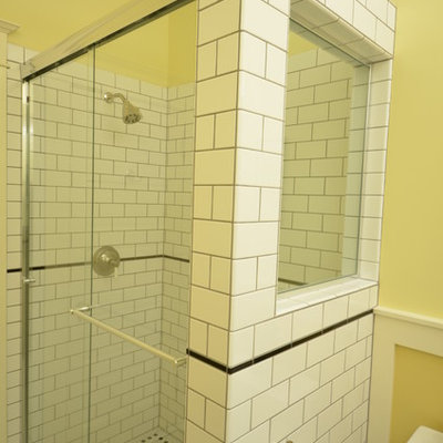 Example of a small arts and crafts black and white tile and ceramic tile ceramic tile alcove shower design in Portland with beaded inset cabinets, white cabinets, a two-piece toilet, yellow walls and a pedestal sink