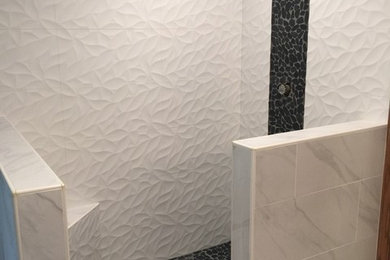 Example of a minimalist master black and white tile porcelain tile bathroom design in Little Rock