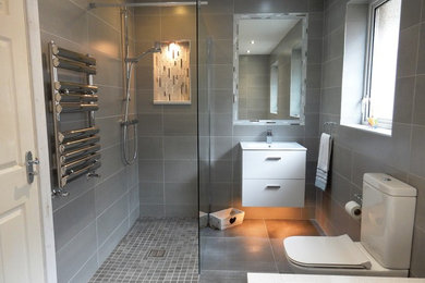 Design ideas for a medium sized contemporary family bathroom in Other with a built-in bath and quartz worktops.
