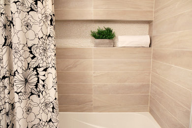 Example of a small minimalist beige tile and ceramic tile vinyl floor and brown floor bathroom design in Calgary with flat-panel cabinets, medium tone wood cabinets, a one-piece toilet, white walls, an undermount sink and quartz countertops