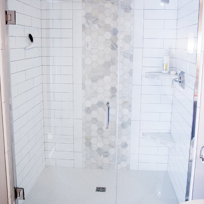 Example of a large trendy 3/4 white tile and stone tile vinyl floor walk-in shower design in Other with recessed-panel cabinets, brown cabinets and gray walls