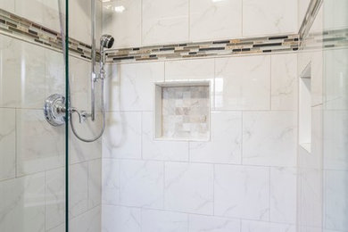 Alcove shower - yellow tile alcove shower idea in Other with a hinged shower door