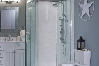 Mid-sized master white tile corner shower photo in Detroit with a drop-in sink, beaded inset cabinets, white cabinets, marble countertops, a two-piece toilet and gray walls