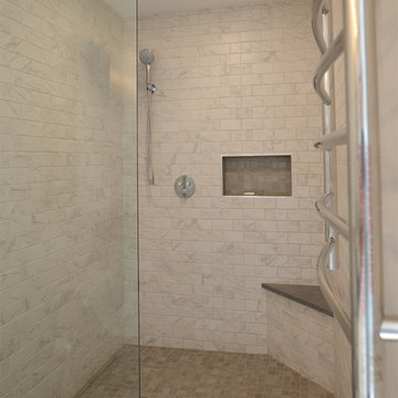 Shower flanked by Heated Towel Rail