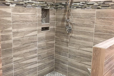 Mid-sized minimalist gray tile gray floor bathroom photo in Other