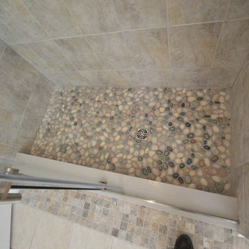 Shower replacement with pebble stone floor