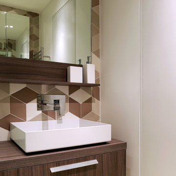 Shower room with walnut vanity and geometric tile