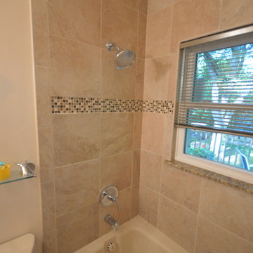 Shower with window and recessed shelf