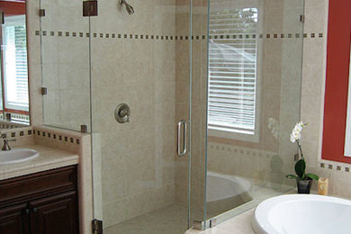 Example of a corner shower design in San Francisco with red walls