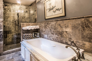 リッチモンドにある中くらいなトランジショナルスタイルのおしゃれなマスターバスルーム (ドロップイン型浴槽、コーナー設置型シャワー、茶色いタイル、磁器タイル、グレーの壁、磁器タイルの床、茶色い床、開き戸のシャワー) の写真