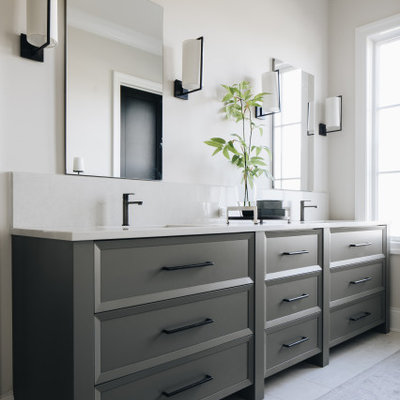 Example of a transitional master white floor and double-sink bathroom design in Chicago with recessed-panel cabinets, gray cabinets, beige walls, quartz countertops, white countertops and a built-in vanity