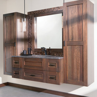 Design ideas for a mid-sized transitional master bathroom in Boston with flat-panel cabinets, medium wood cabinets, brown tile, metal tile, white walls, porcelain floors, an undermount sink, solid surface benchtops, grey floor and multi-coloured benchtops.