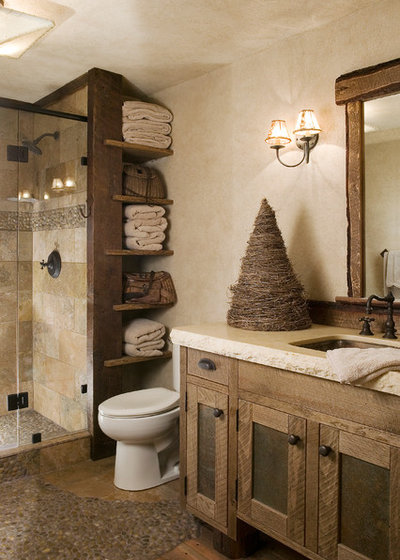 Rustic Bathroom by High Camp Home