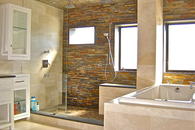 Inspiration for a medium sized contemporary ensuite bathroom in Cincinnati with flat-panel cabinets, white cabinets, an alcove bath, a walk-in shower, slate tiles, grey walls, limestone flooring, beige floors and an open shower.