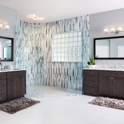 Mid-sized minimalist master gray tile and glass tile porcelain tile and white floor bathroom photo in Austin with shaker cabinets, gray cabinets, gray walls, an undermount sink, quartzite countertops and white countertops
