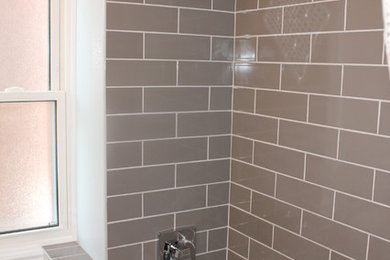 Inspiration for a small modern gray tile and ceramic tile bathroom remodel in Toronto