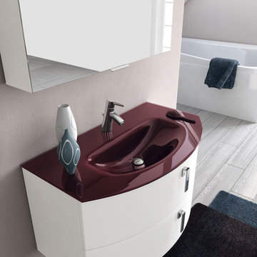 Small bathroom with white and mauve colored vanity