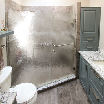 Small Masterbath with Green Cabinetry, Custom Tiled Shower and Storage