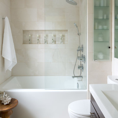 Example of a trendy beige tile alcove bathtub design in Toronto